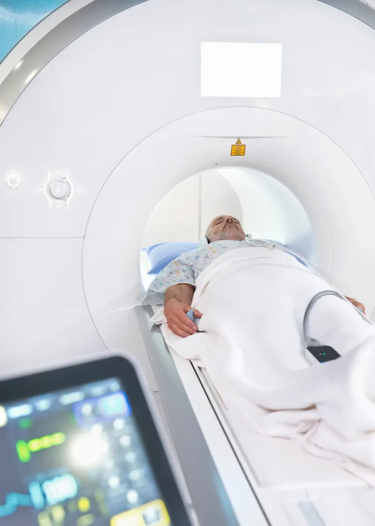A man going through an MRI scan paid for by his fixed indemnity insurance.
