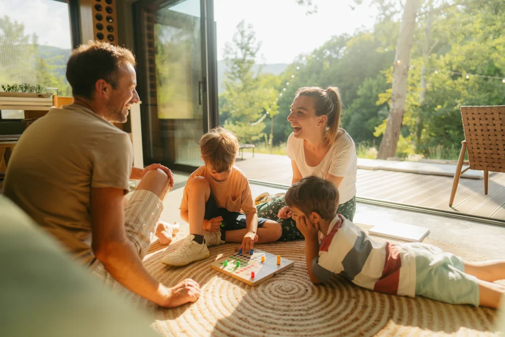 a young family playing a game together